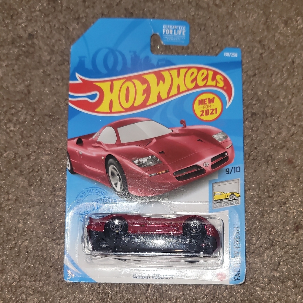 Red Nissan R390 GT1 Toy Car
